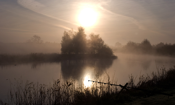 Misty view fishing on lake