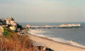 Sandy beach and pier