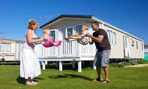 Family outside Static Caravan