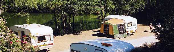 Touring pitches beside lake